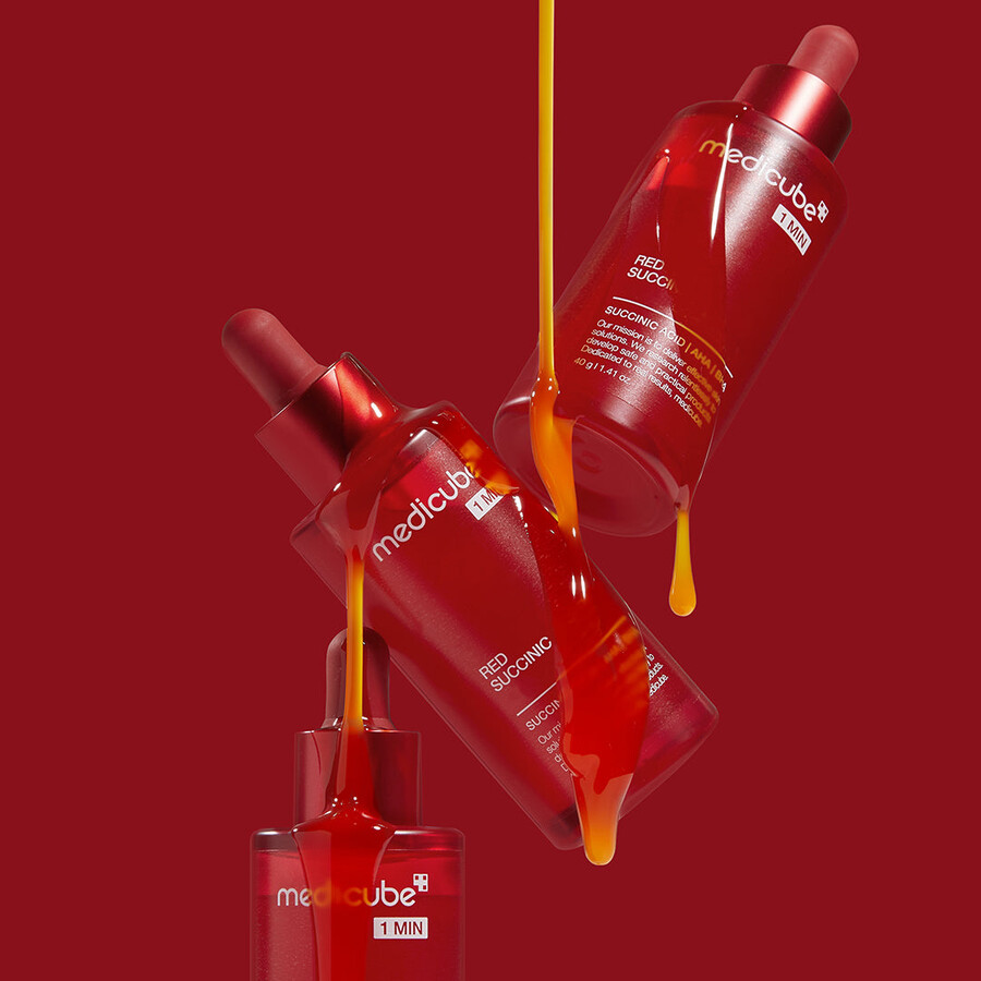 suero limpiador potenciador con ácido succínico rojo al 21 de medicube